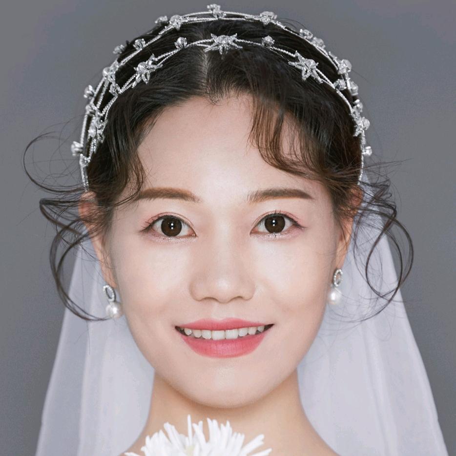 哲小姐