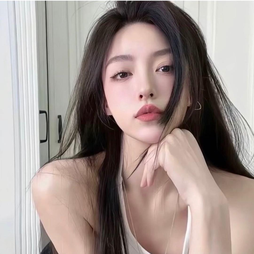 T.