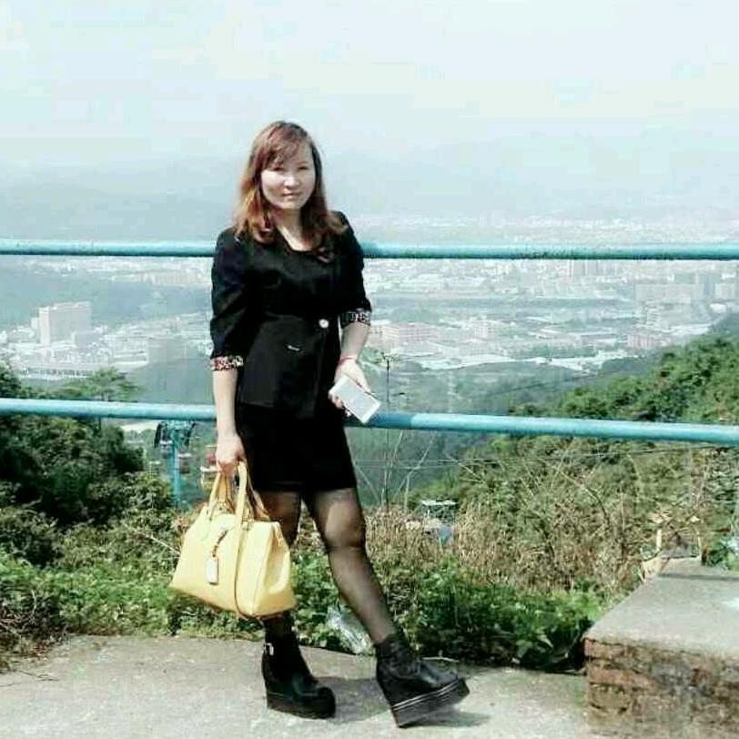 闻莉