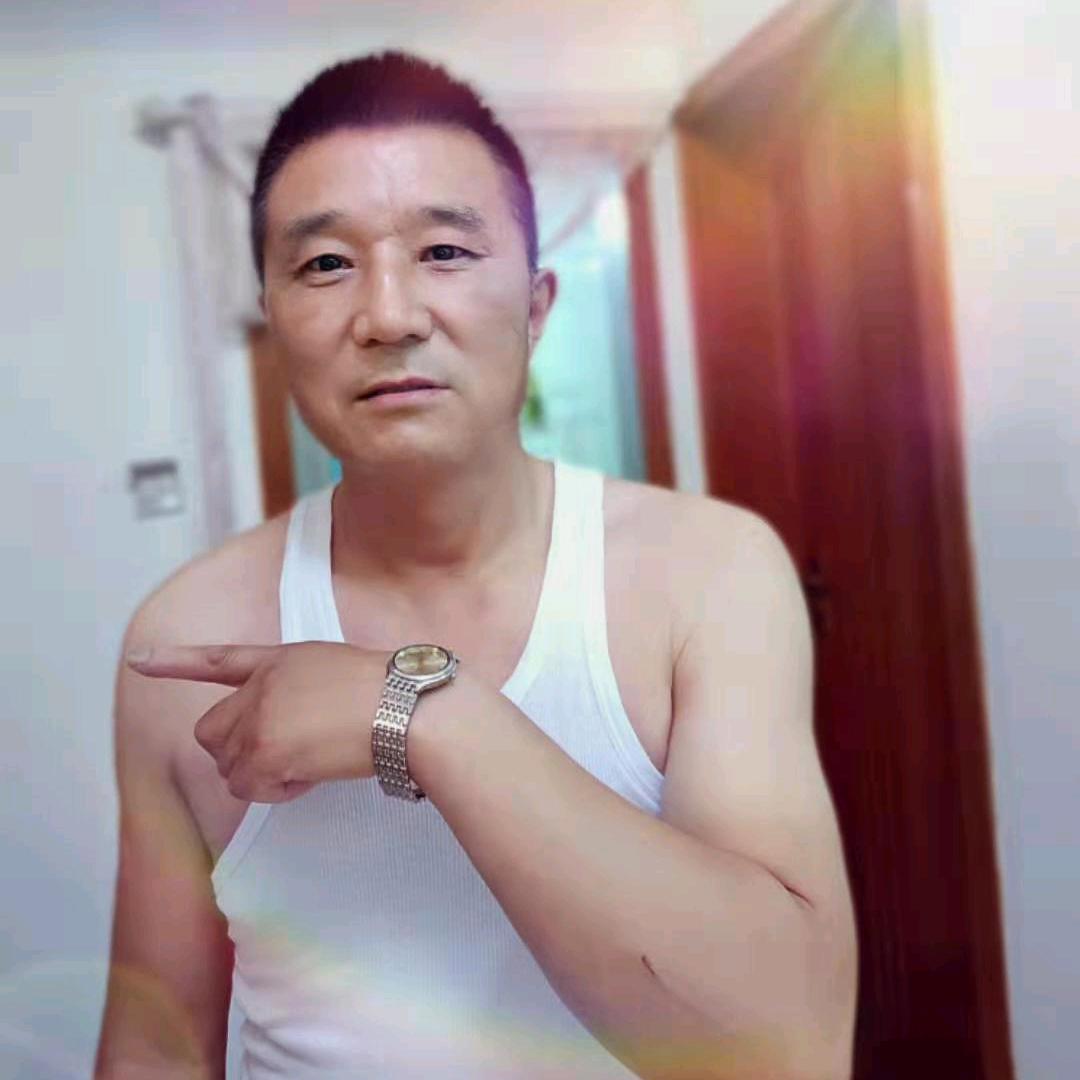 梁成