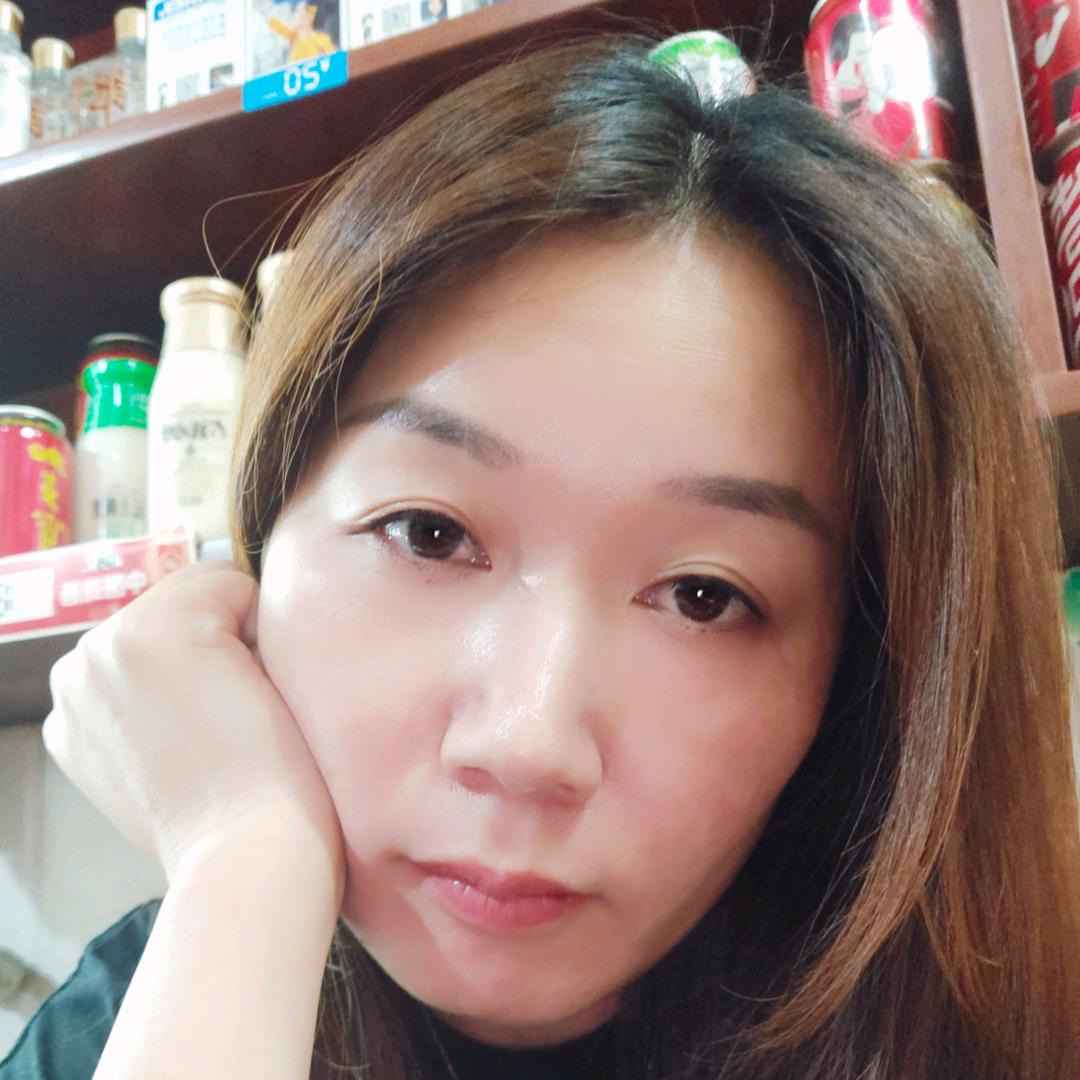 嫣然
