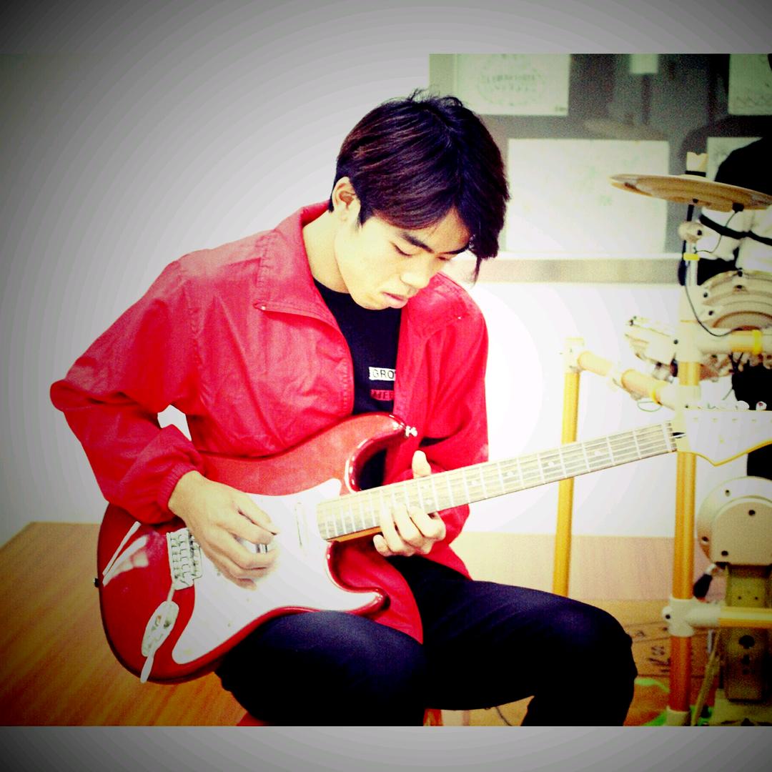 教吉他的黄老师