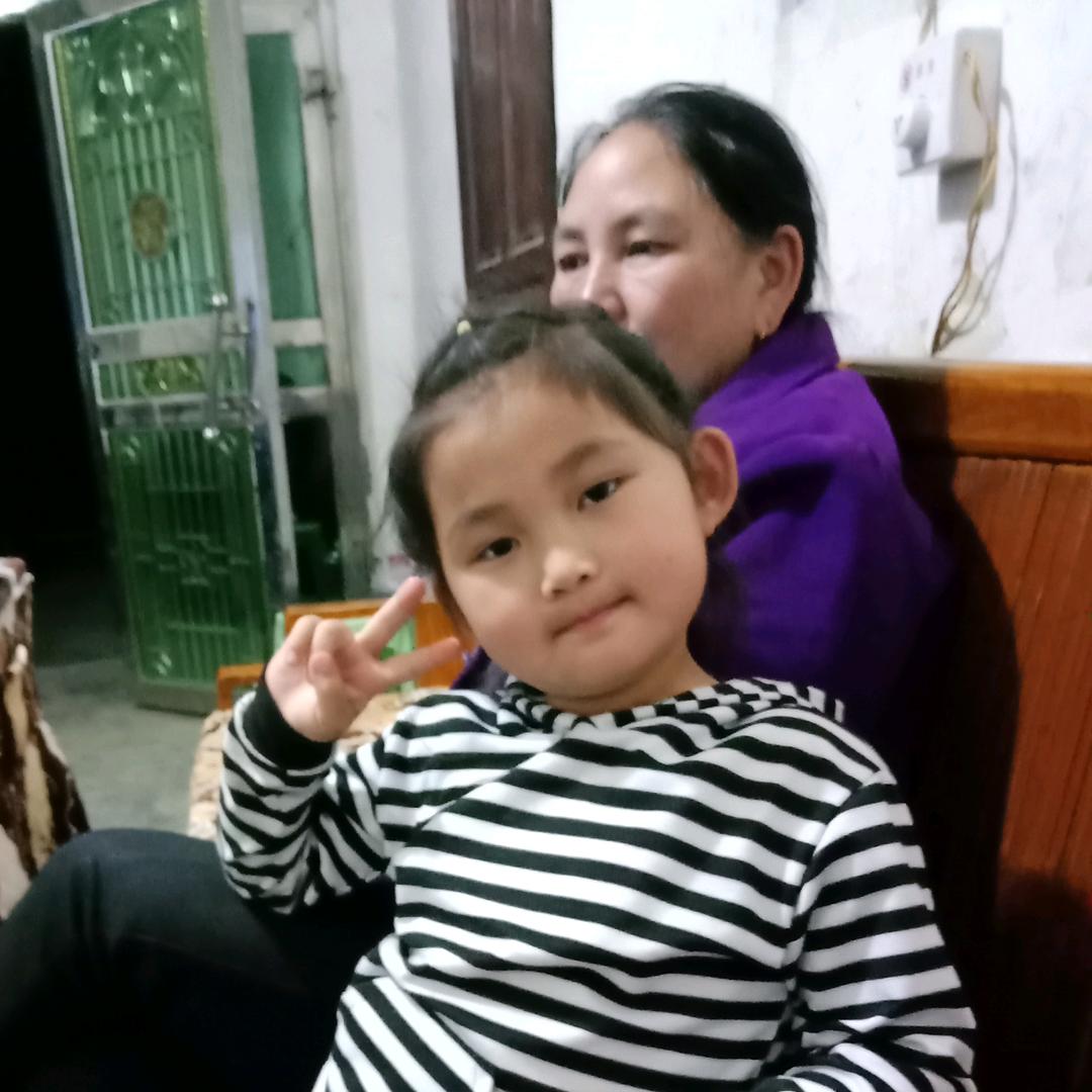 梅成英