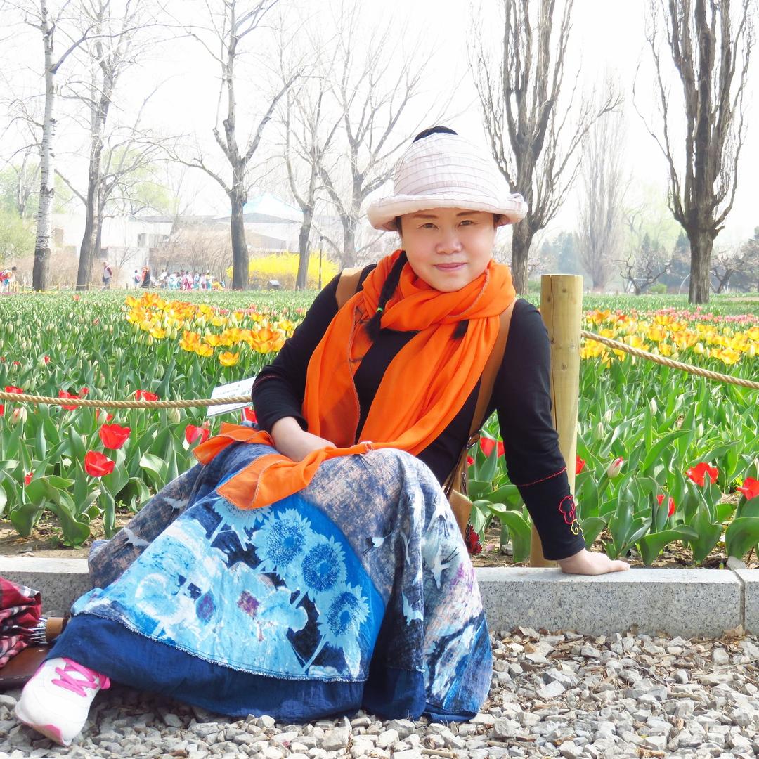 阿吉格（王会丽）