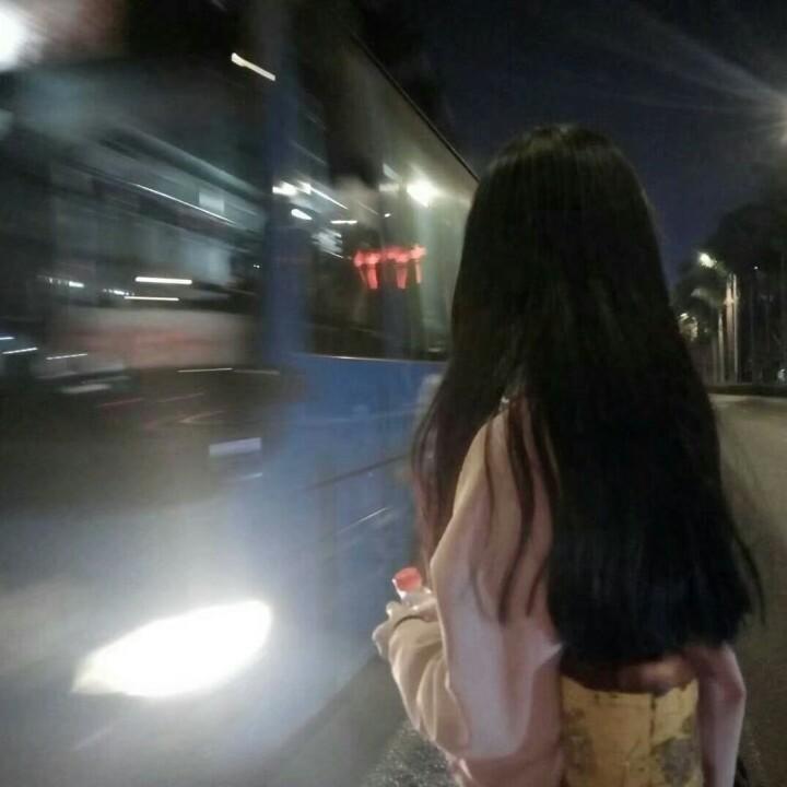 T.