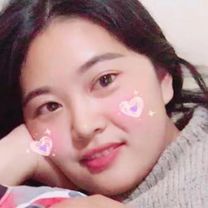 贾**