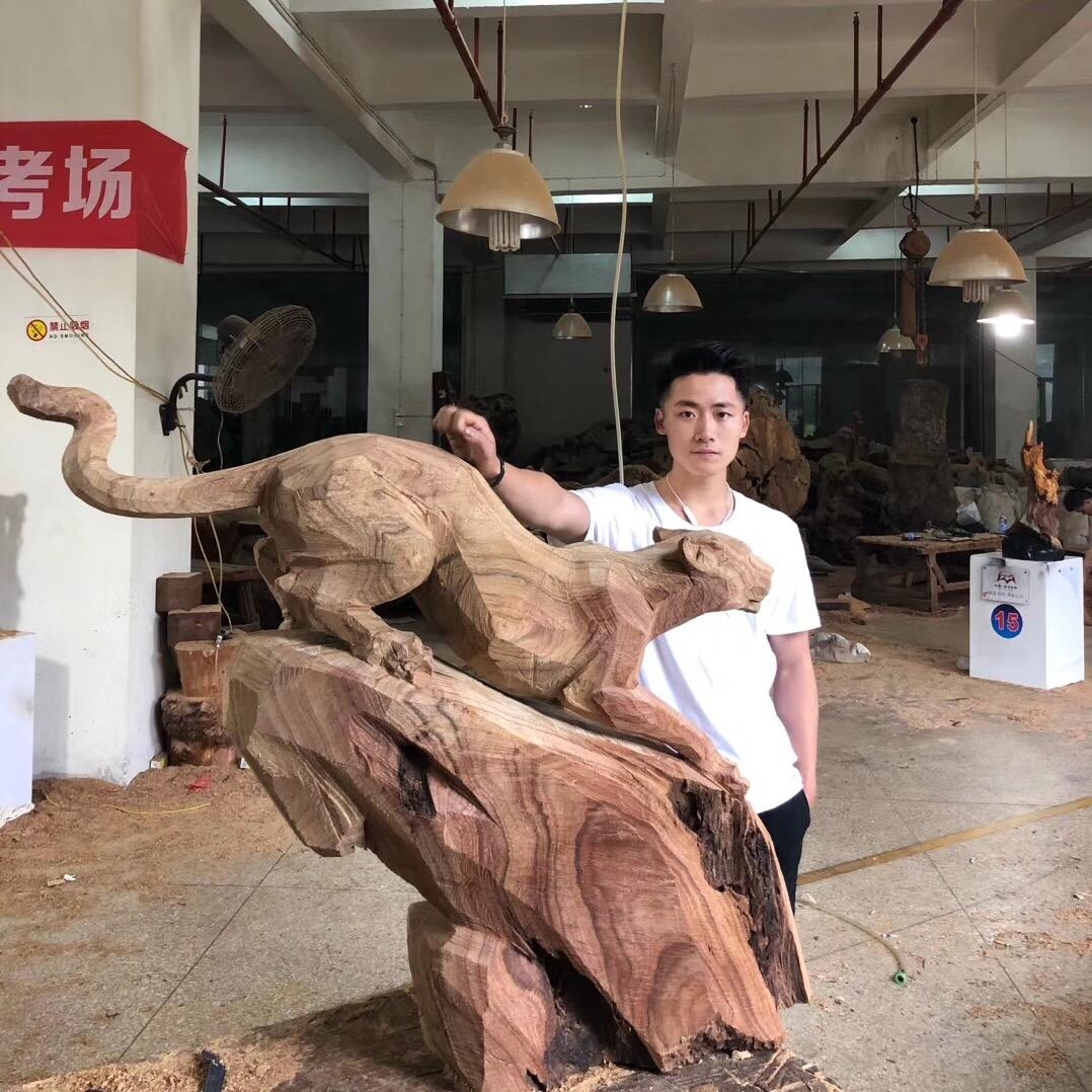 郑潇木雕工艺品店