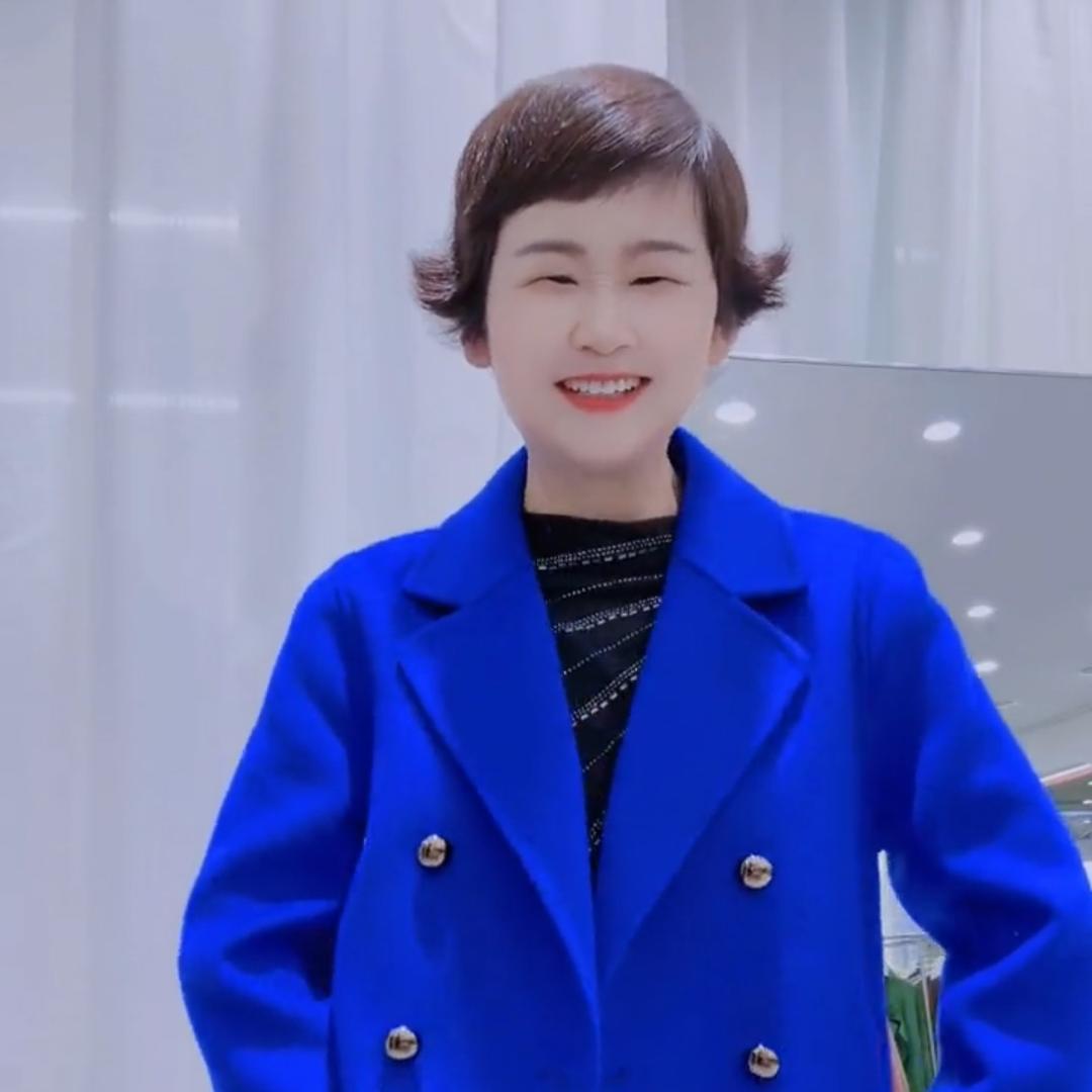 临泉义务商贸城九街东头羊绒大衣店