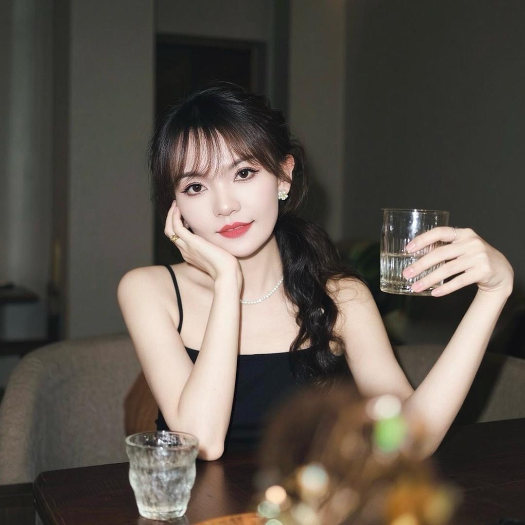 哈 尼 。