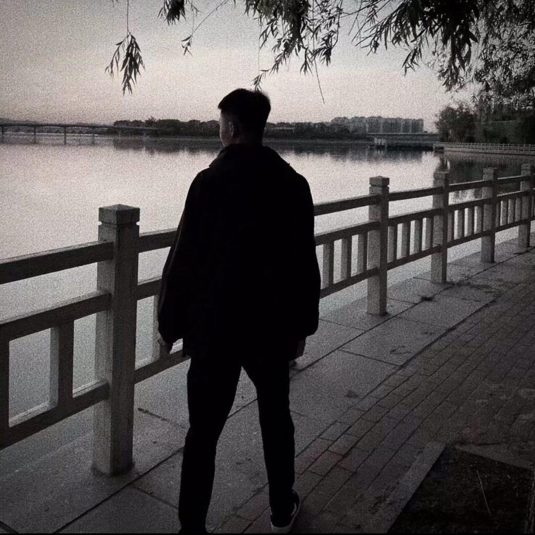 穆/扎