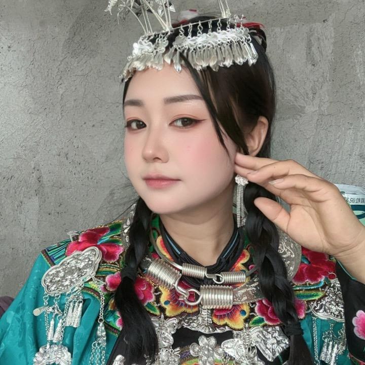 (苗家三妹)
