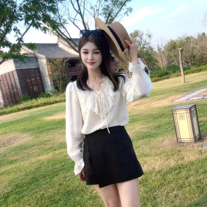 李莎.