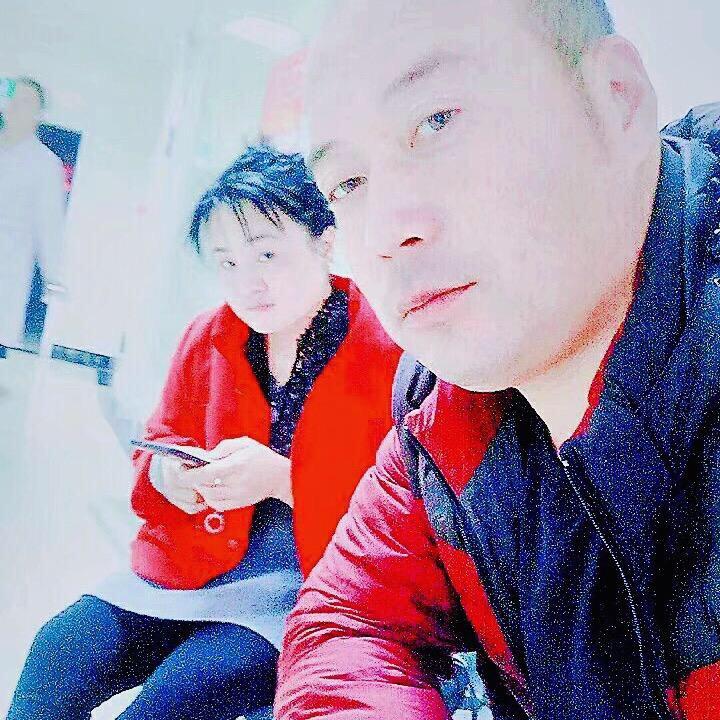 傅 