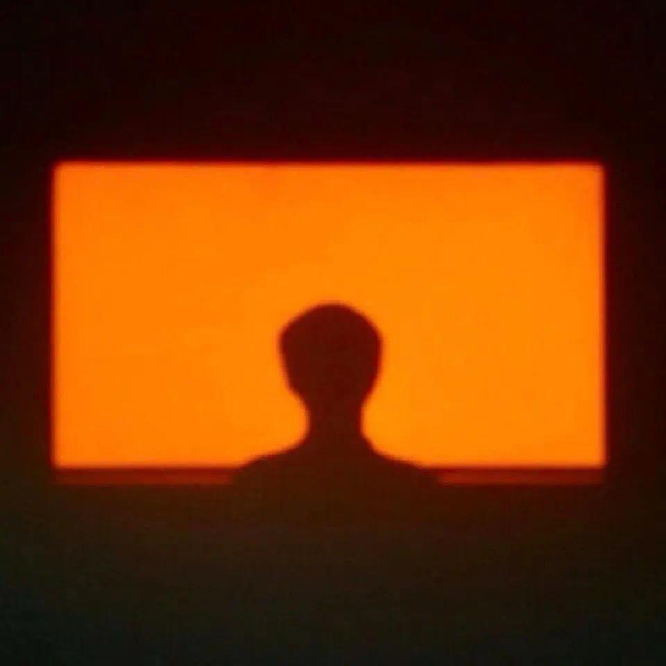 J.