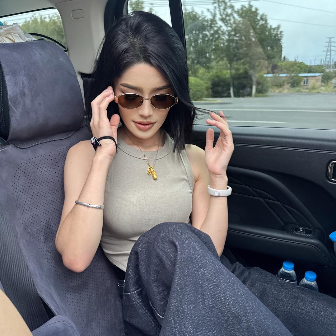 莉•