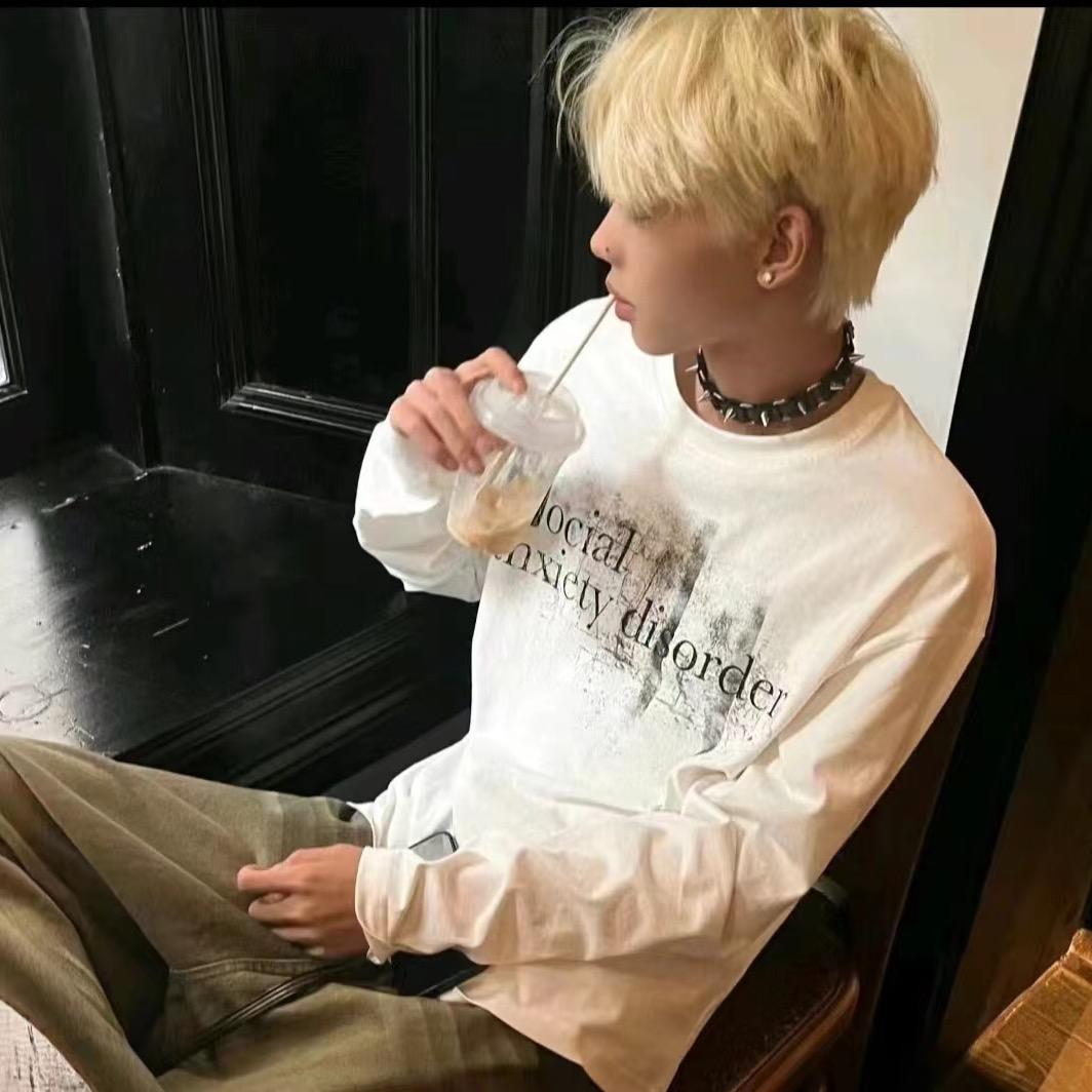 J.