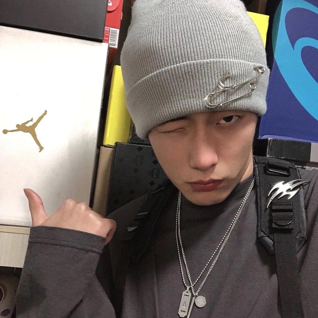 T.