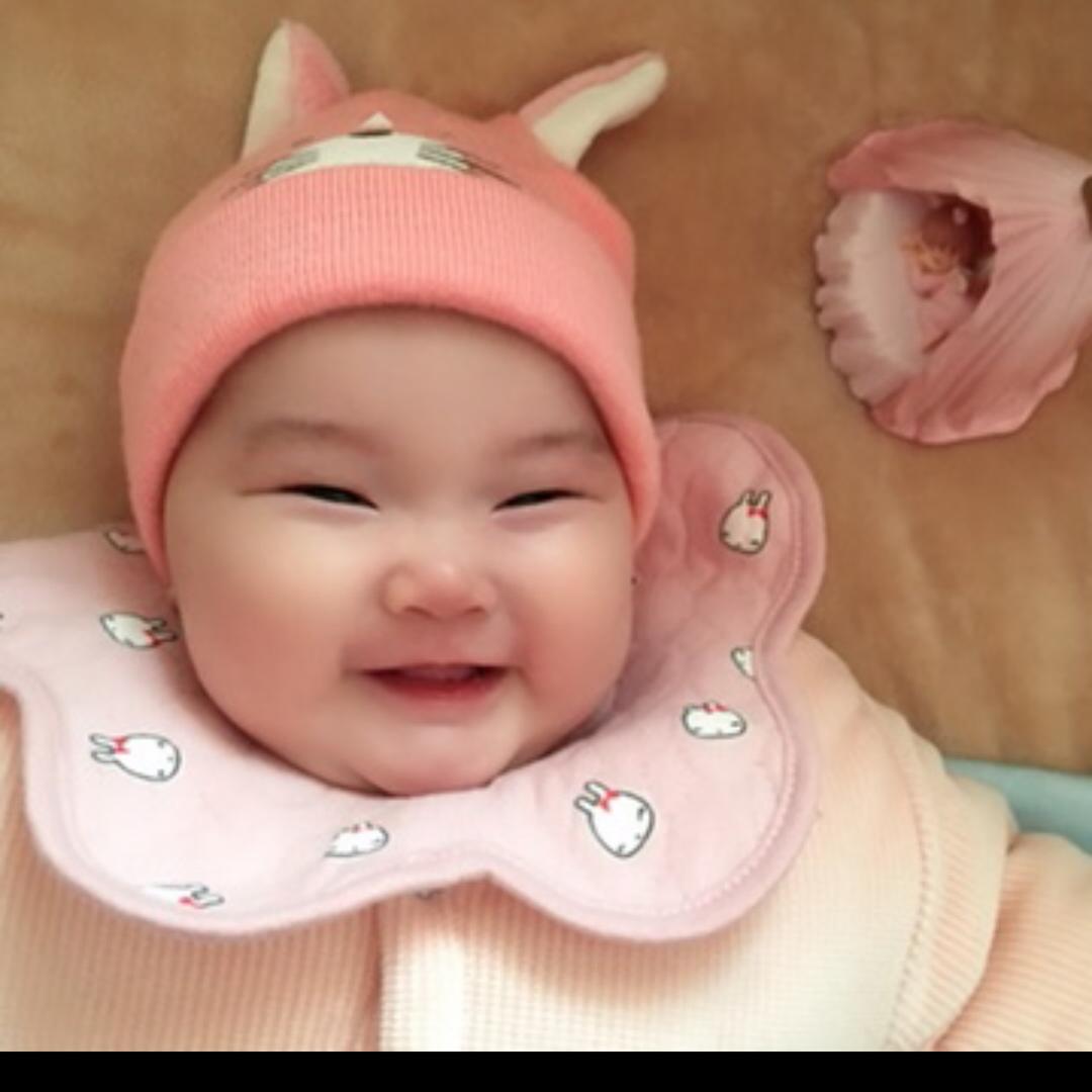 华
