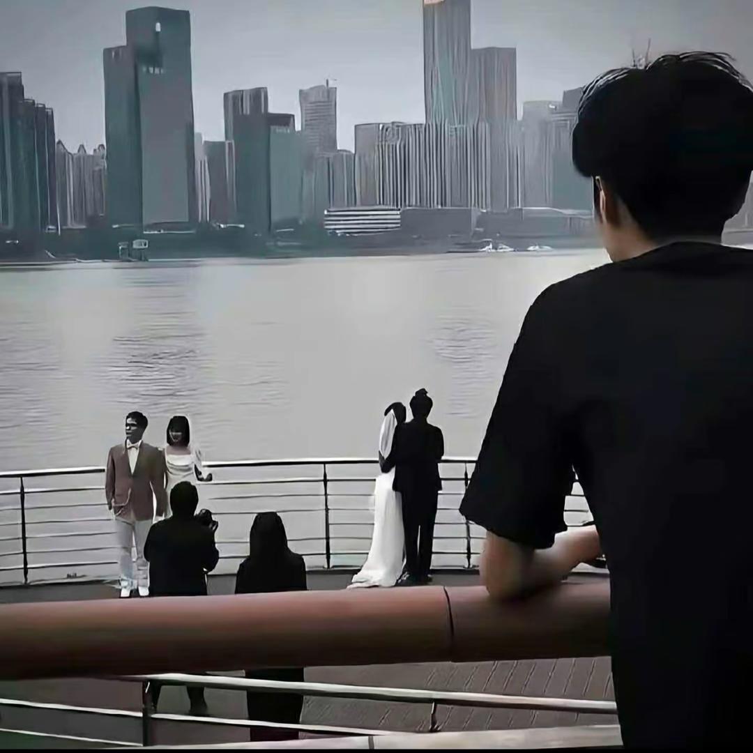 某总