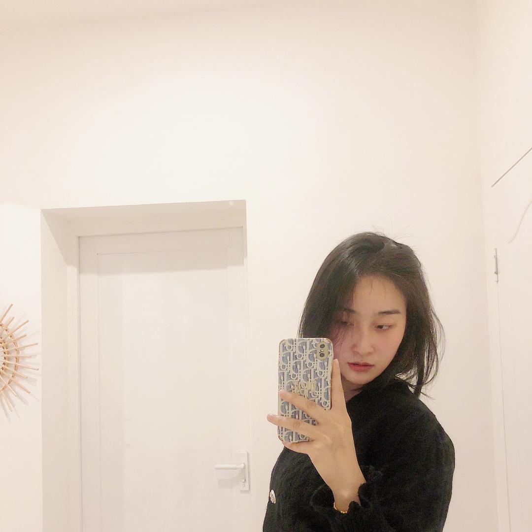 M.
