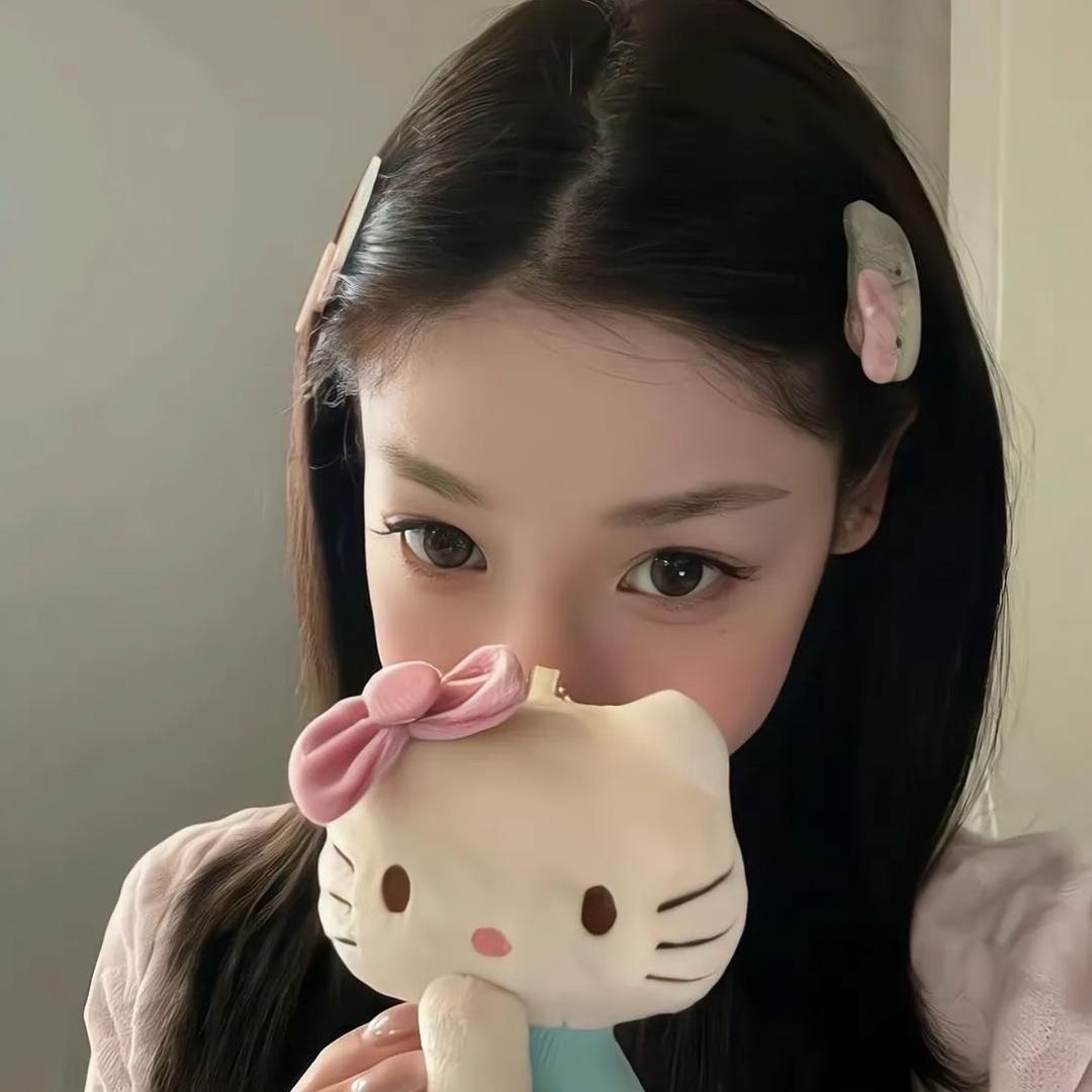 萱.
