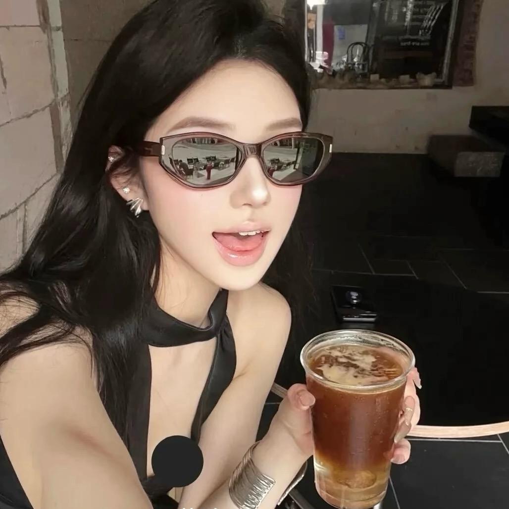 J.