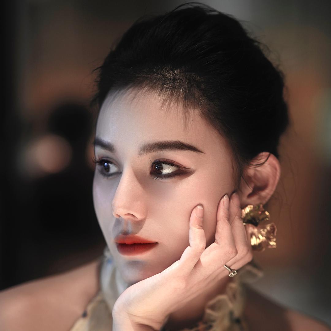 露熙姐姐 （美灵兰老板娘）