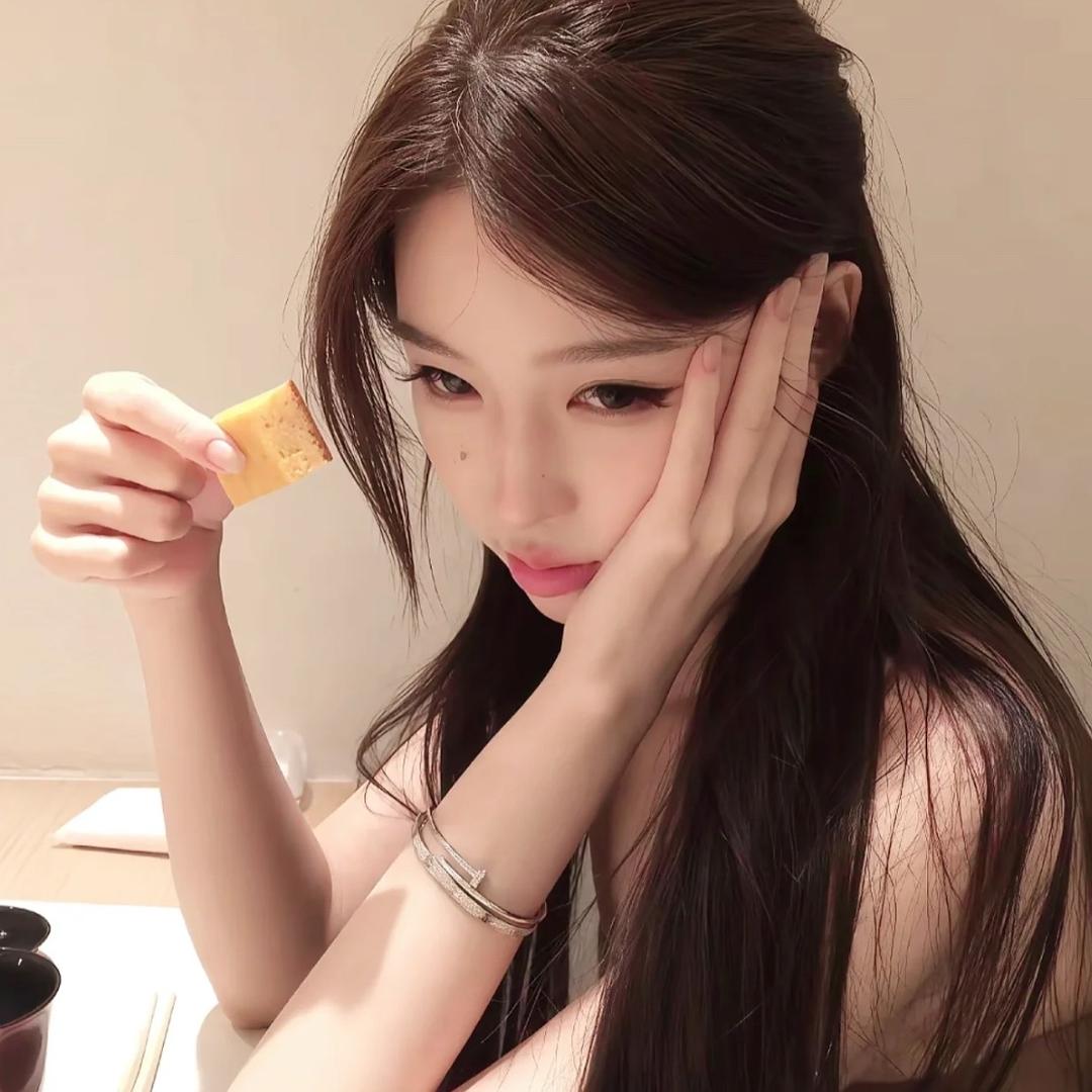 T.