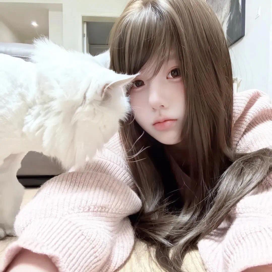 心如^.