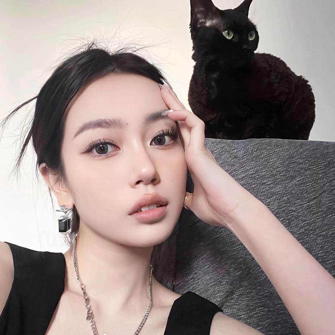 小 Q.