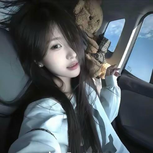 七七