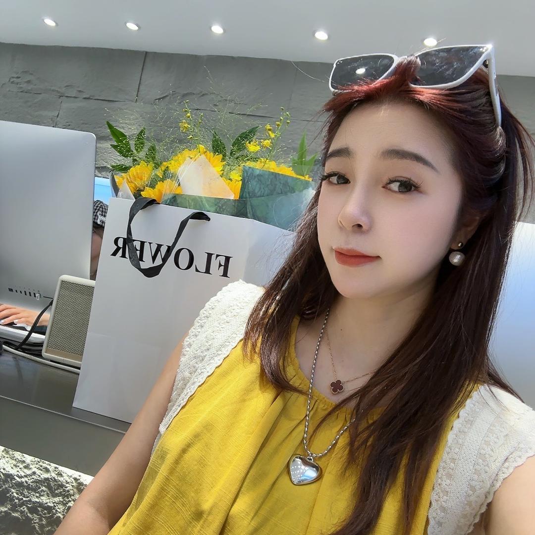 荷花池陈花花女装