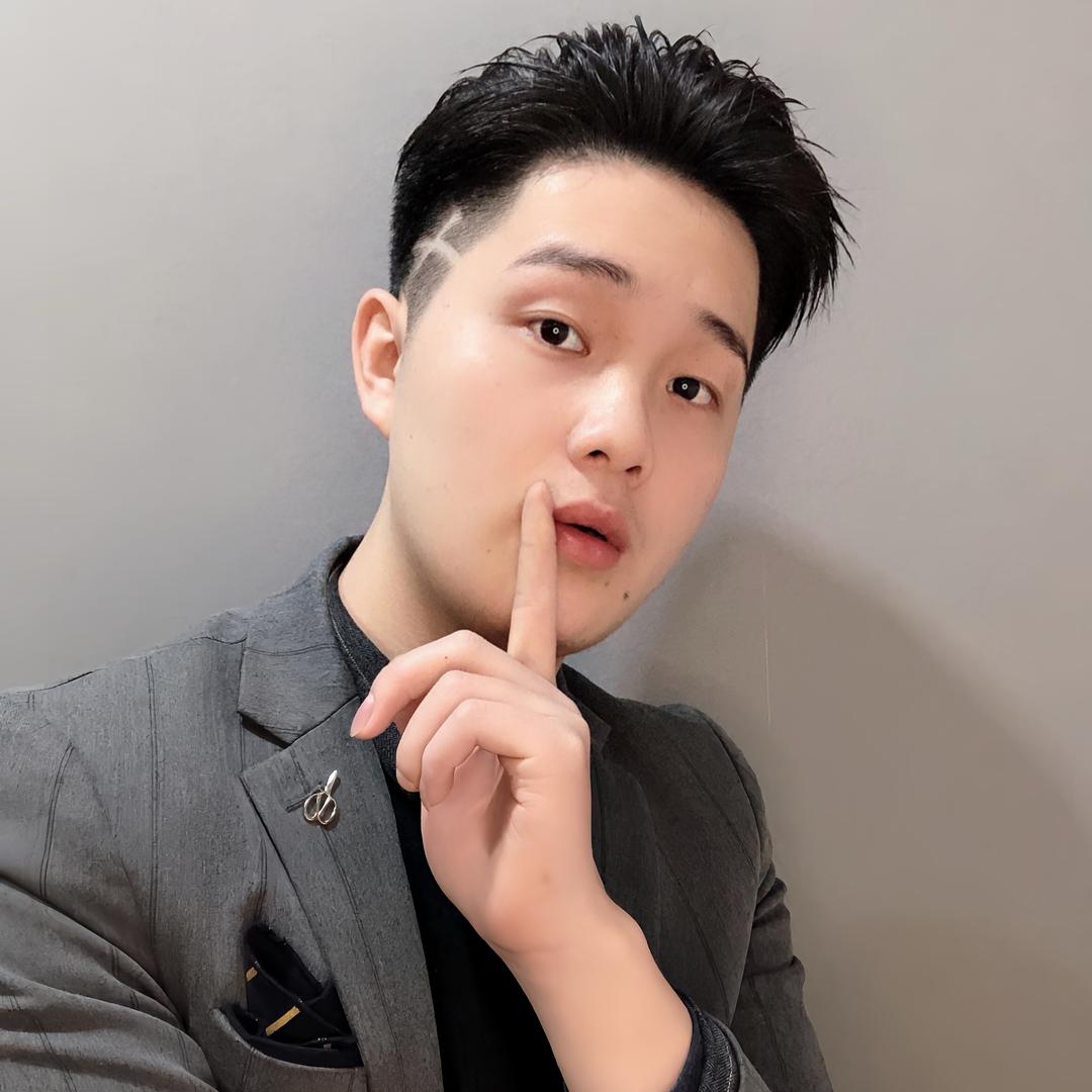 在祁东会根据脸型设计发型的世明