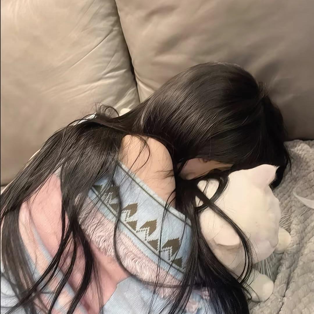 七七