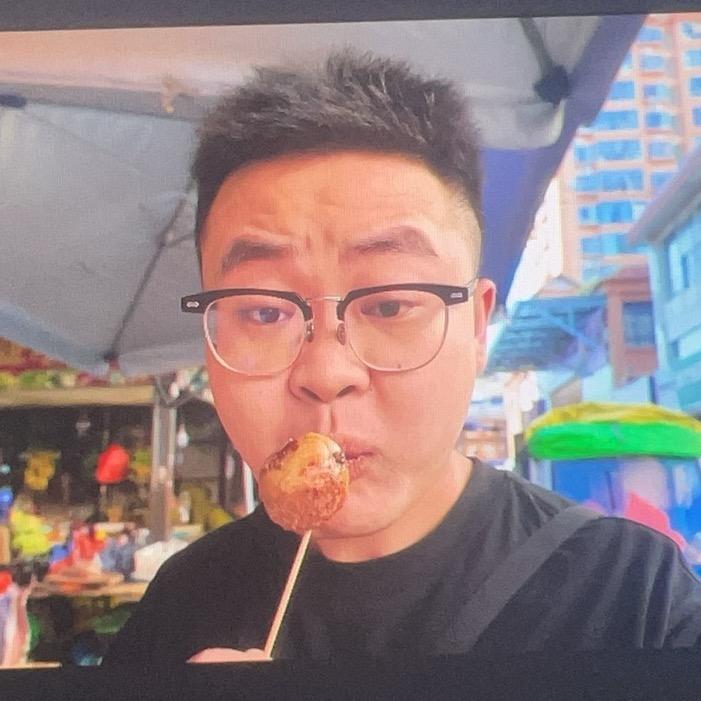 在西双版纳做旅游的小鹿