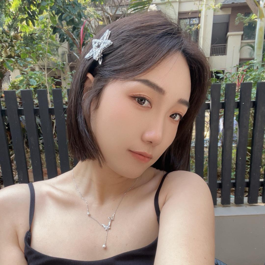 X哥.