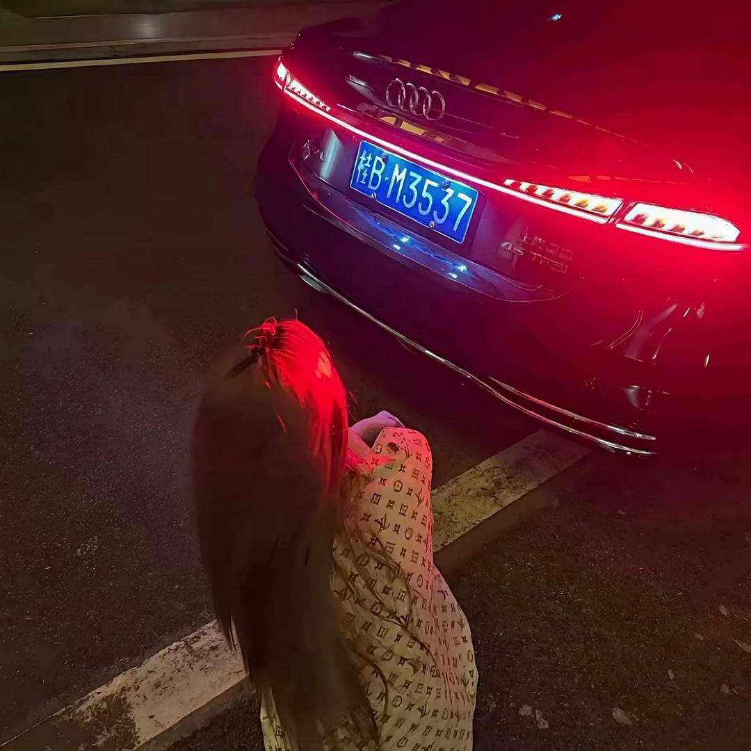 七七