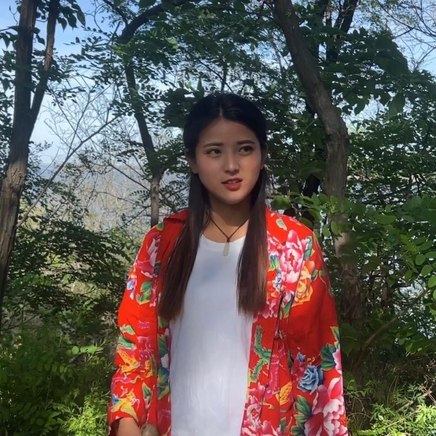 张优美°