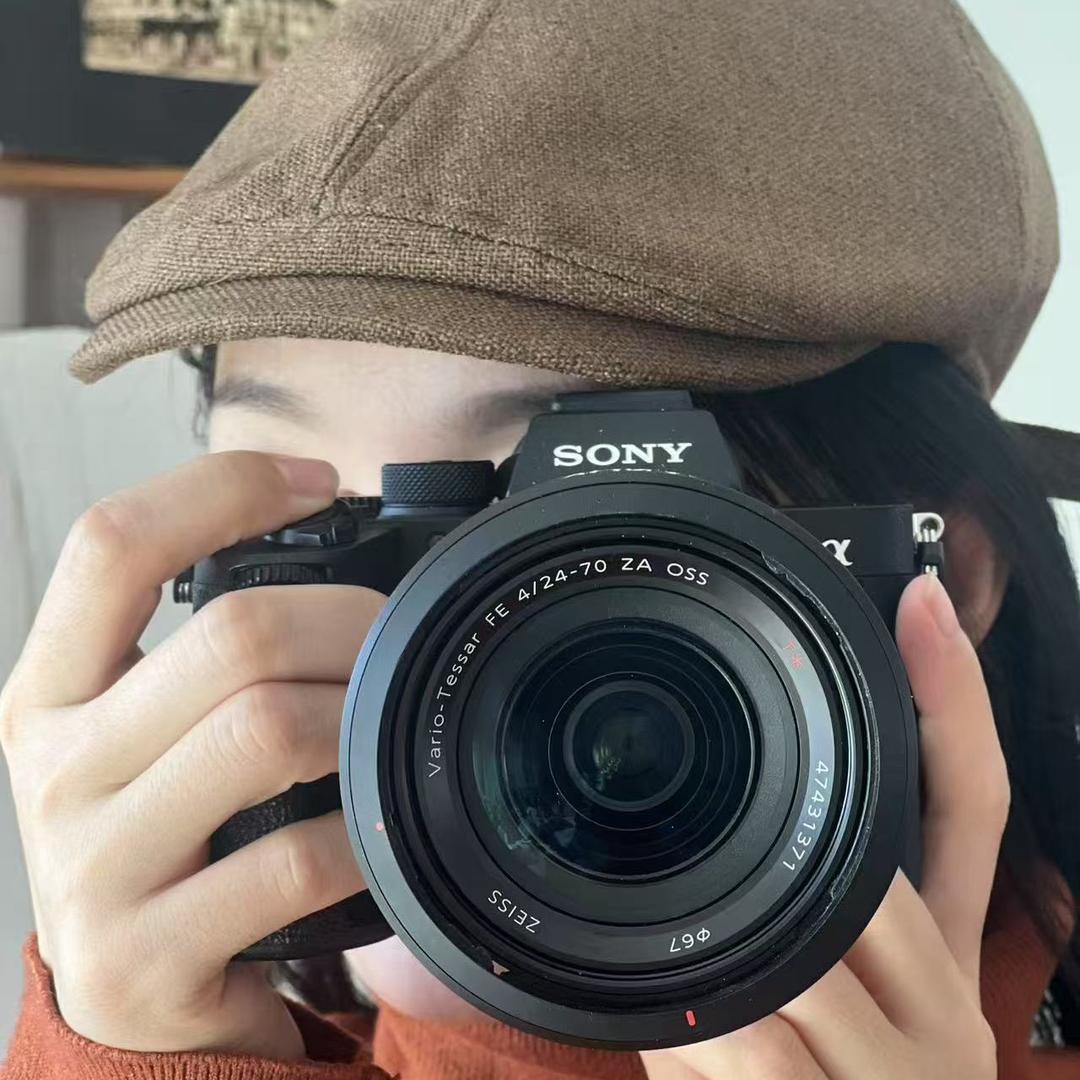 端着微距拍水贝