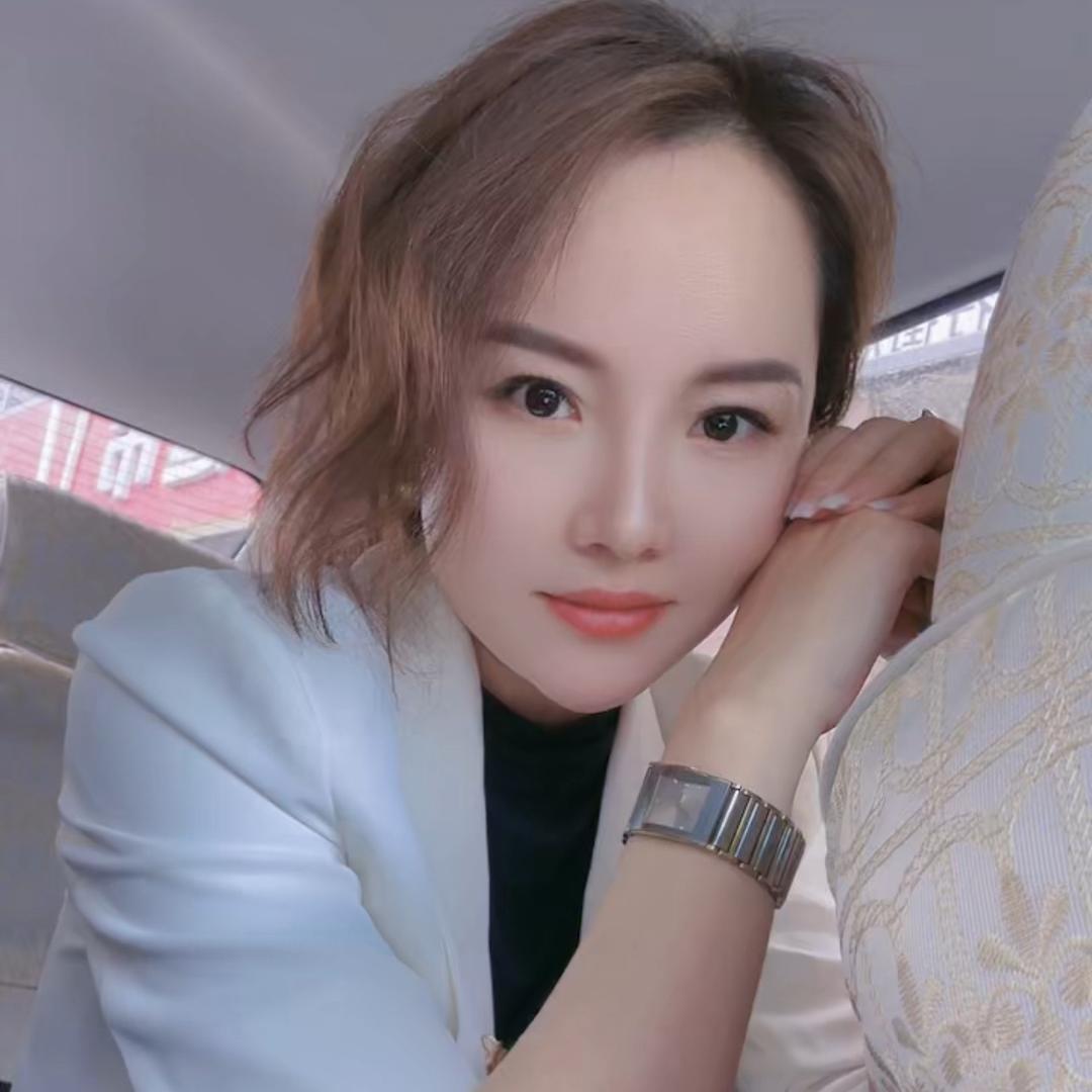 黄 女士