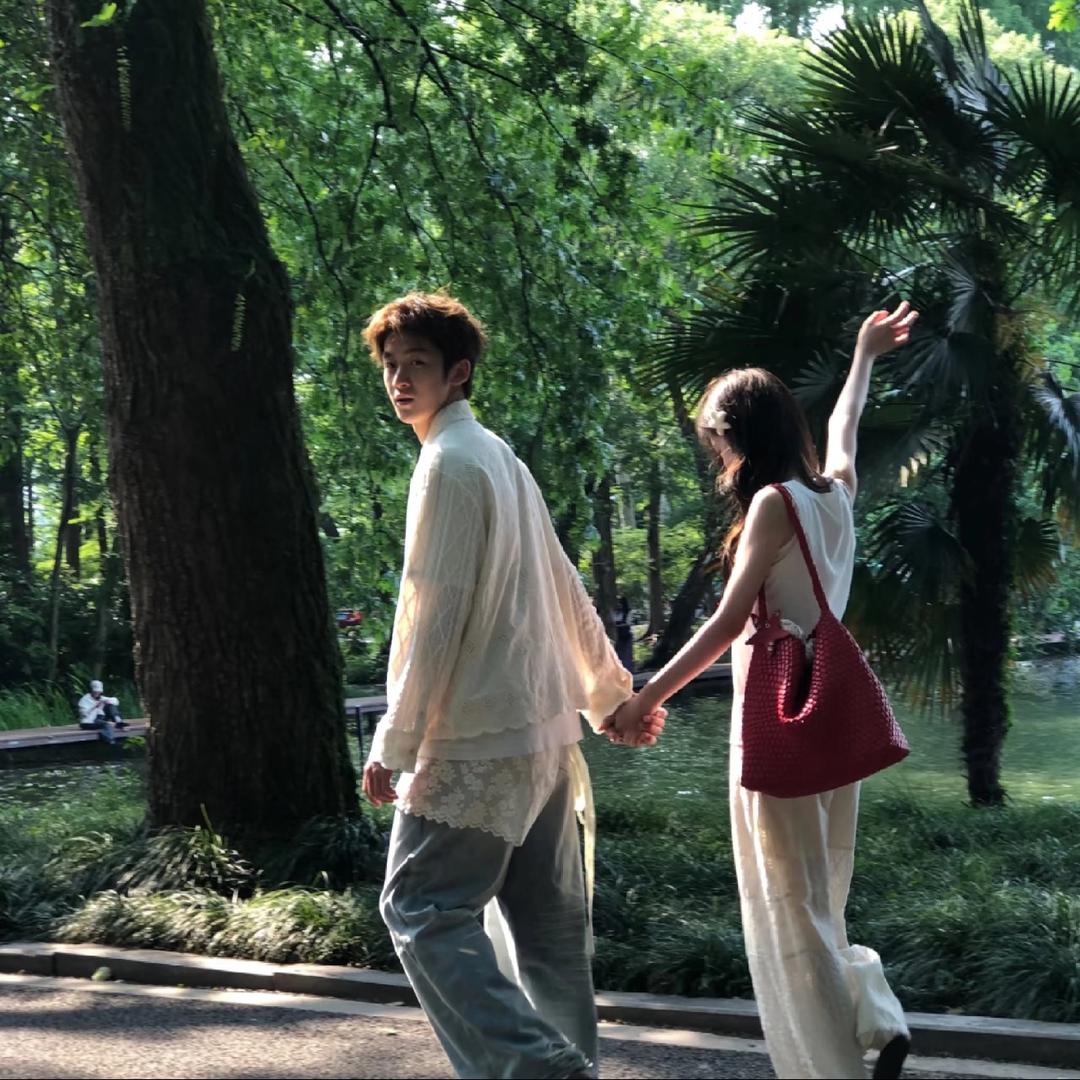 摄影师  言