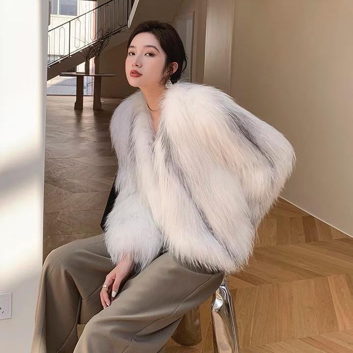 橙子皮草服饰