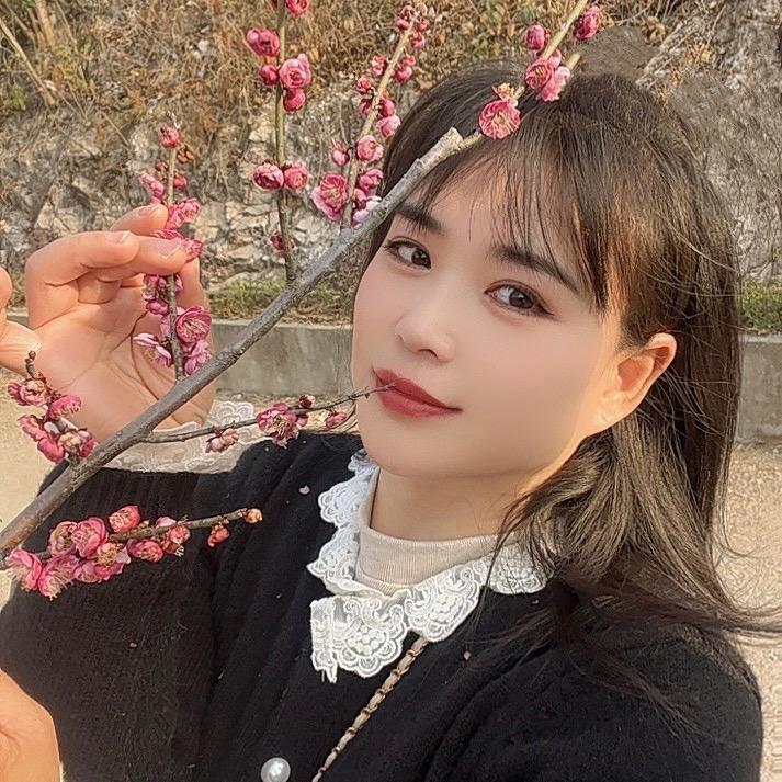 @丁一