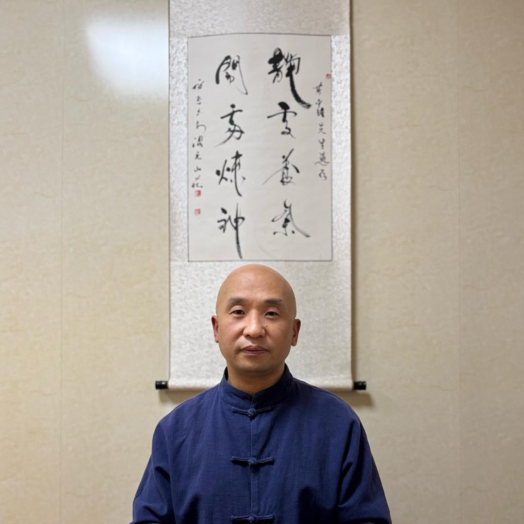 意明先生