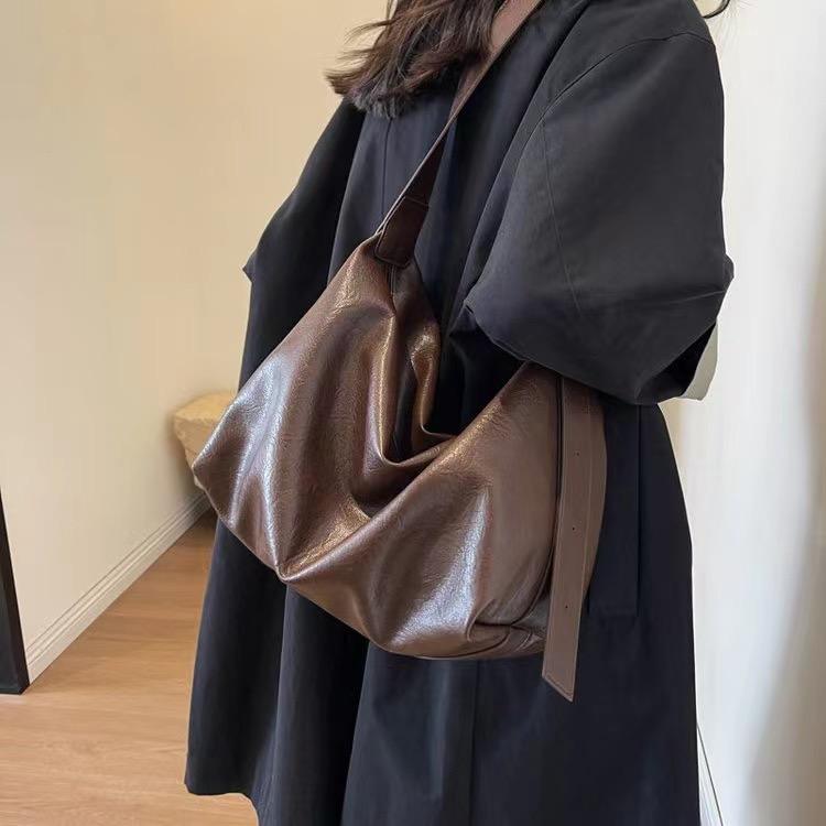 一间美包买手店