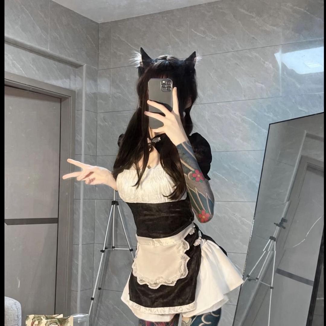 妩