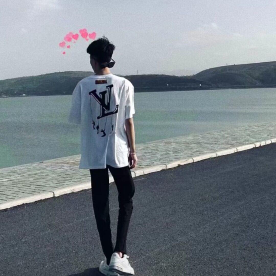 七七