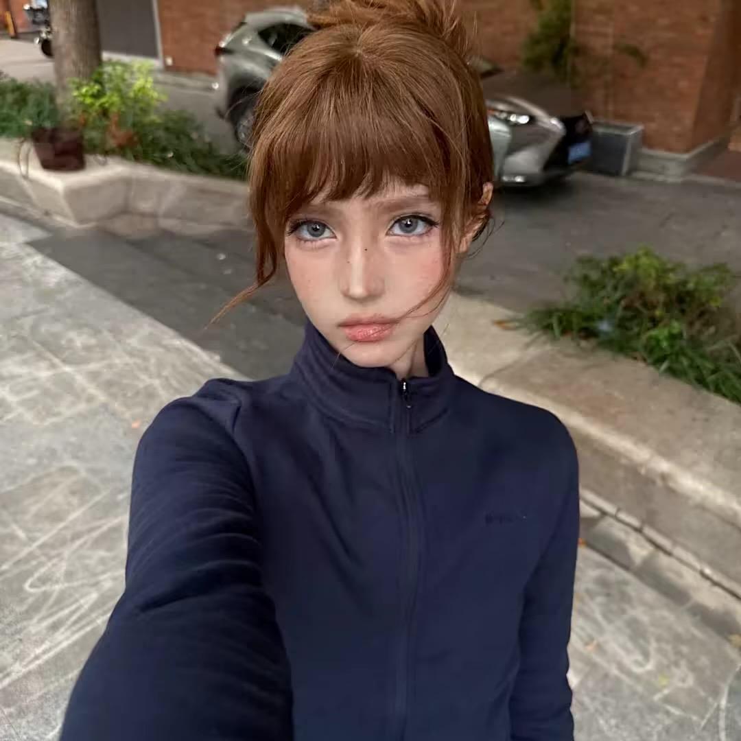 妮 妮