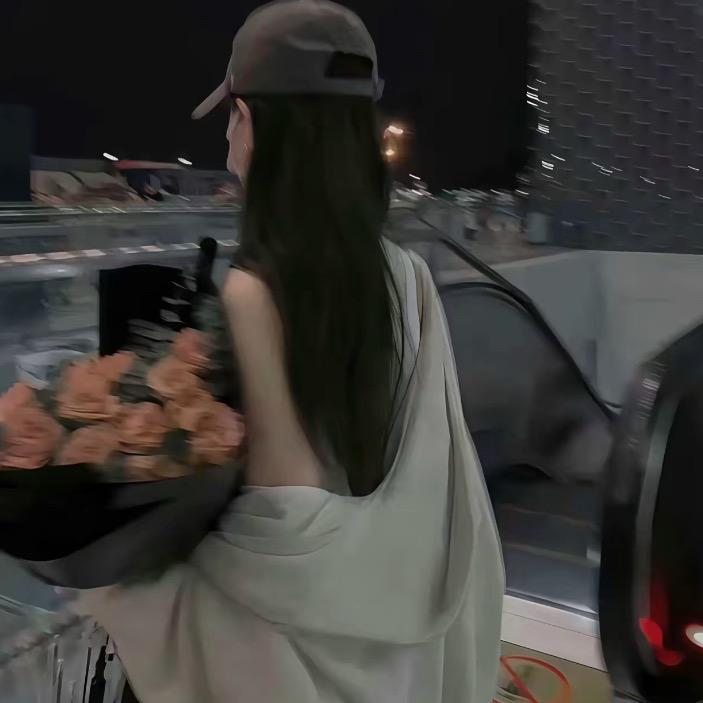 柒月.