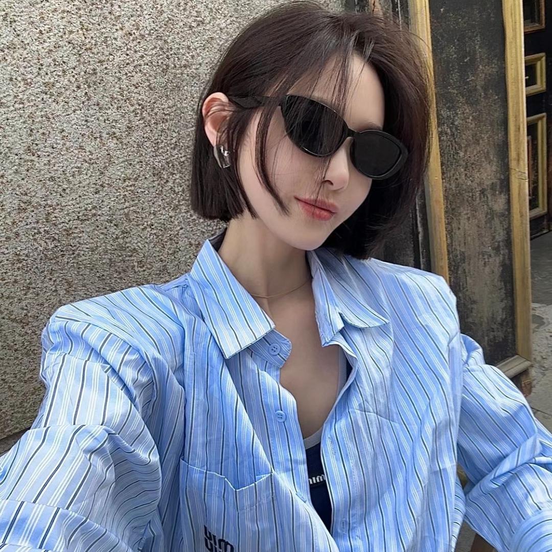 麦子吖.